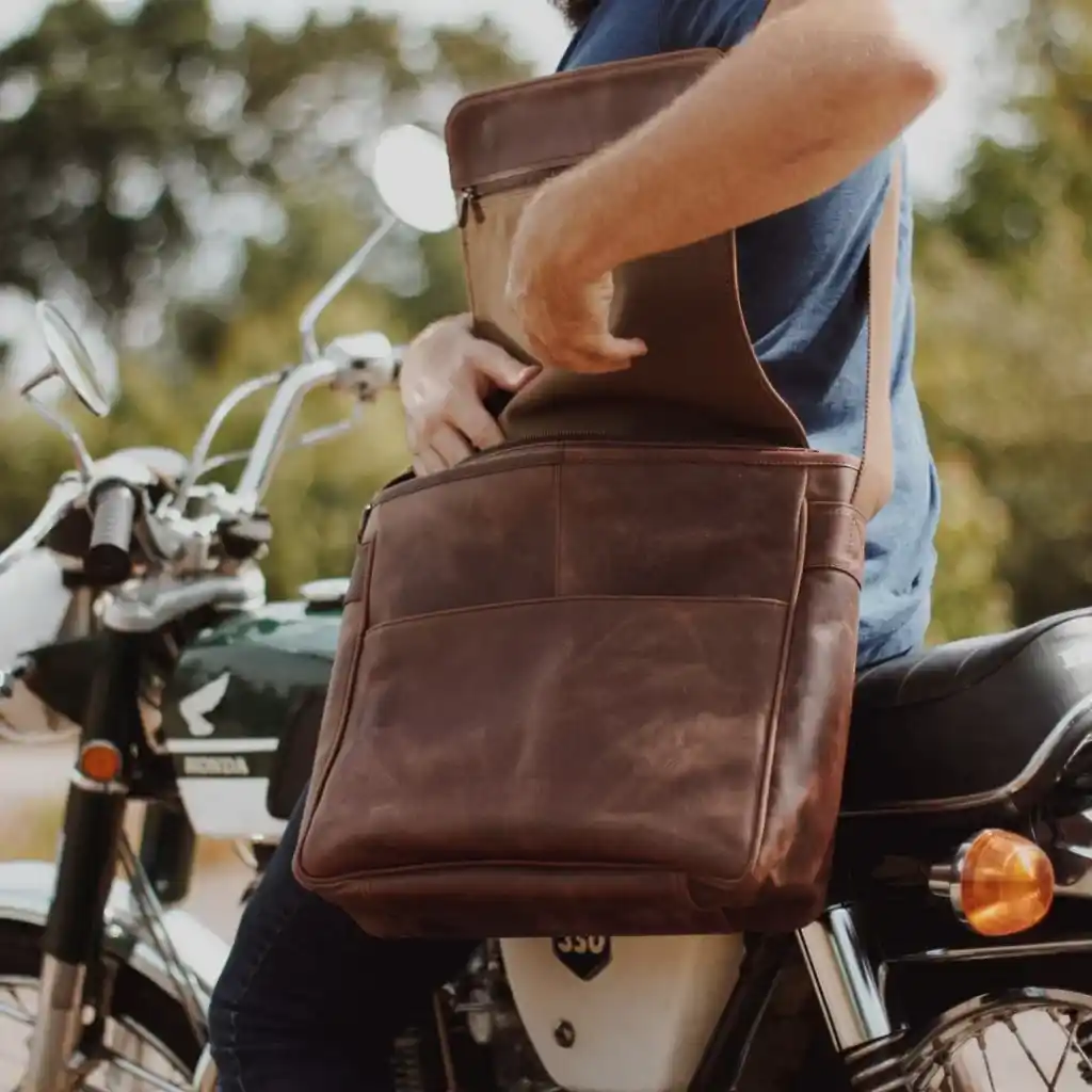 brown messenger backpack made of Leather