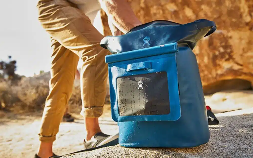 a man holding his Hydro Flask Day Escape Soft Cooler Pack