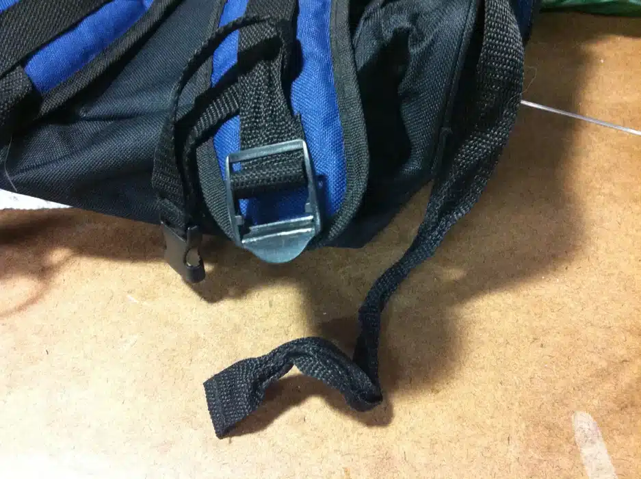 a bag with a broken strap adjuster