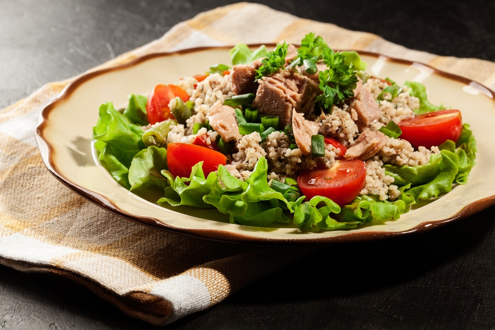 Tasty Salad With Couscous Tuna And Vegetables On The Plate