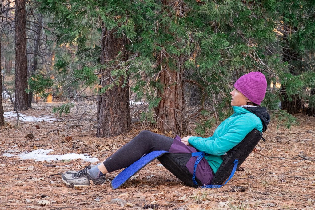 a lady sitting on Crazy Creek Hex