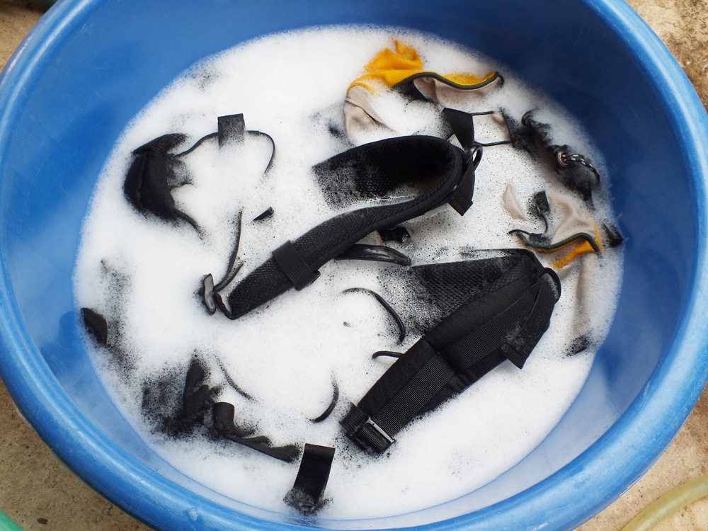 Top View Of Backpacks Soak In Powder Detergent Water Dissolution