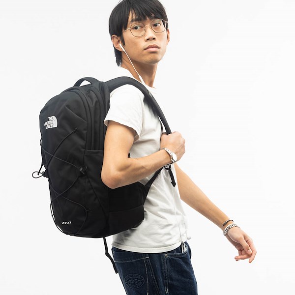 a boy wearing north face jester backpack a boy wearing north face jester backpack