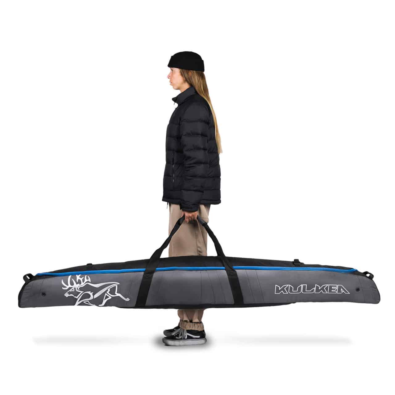 a girl holding kulkea ski bag isolated on a white background a girl holding kulkea ski bag isolated on a white background