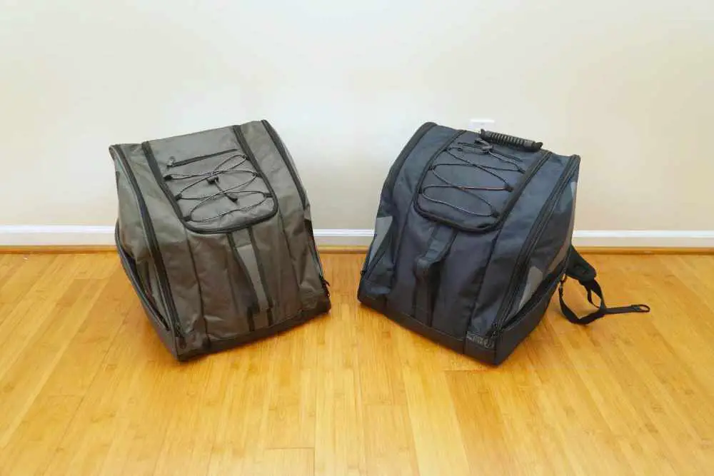 outdoor master boot bags placed on a wooden surface
