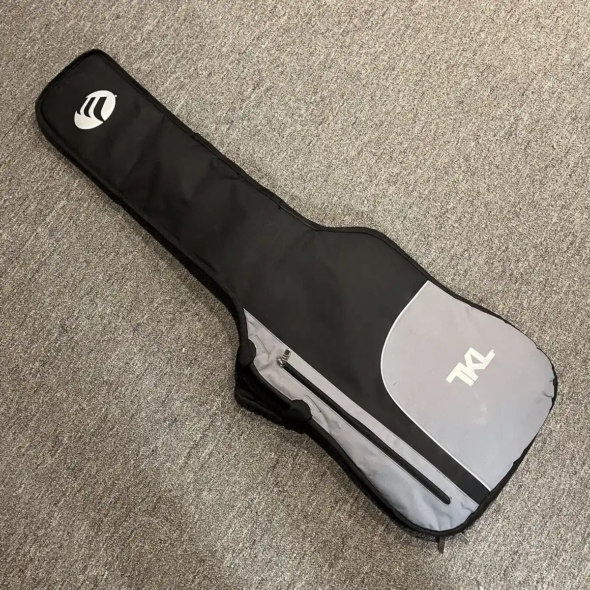 Padded Backpack Style Guitar Case on a solid background