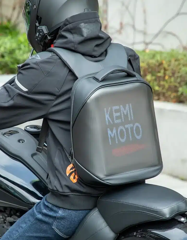 a biker wearing Kemimoto LED Backpack