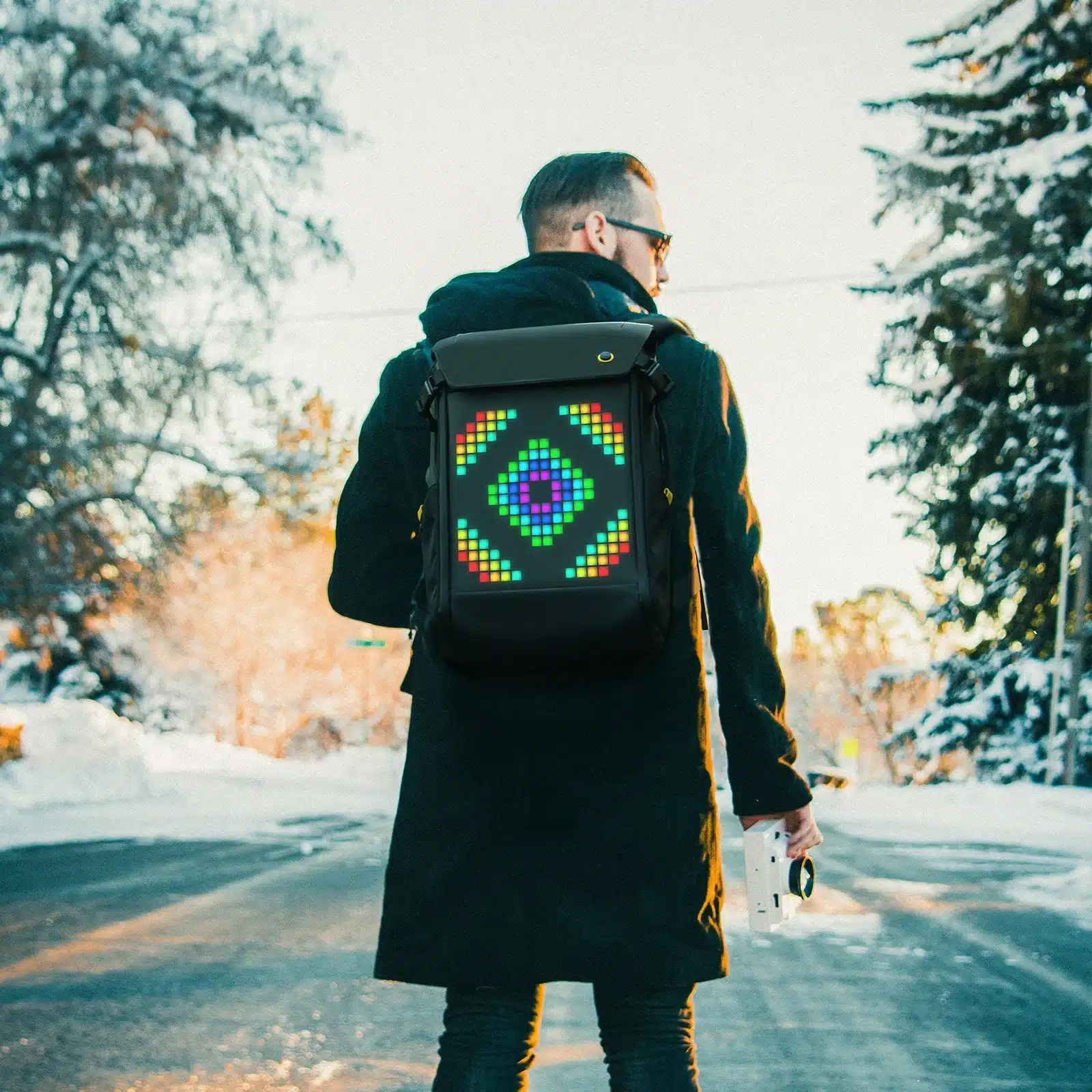 back of a boy wearing a cool Divoom Pixoo M LED Backpack back of a boy wearing a cool Divoom Pixoo M LED Backpack