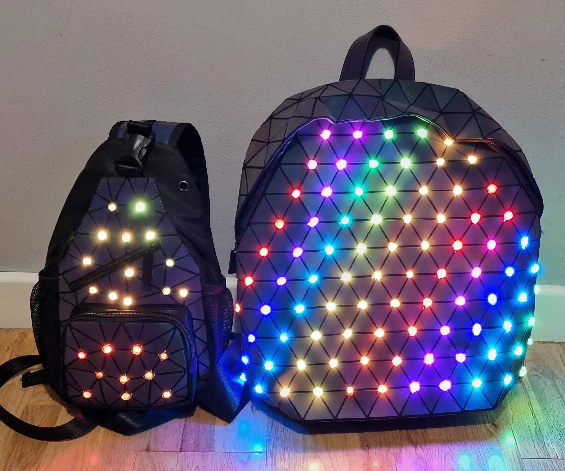 black backpacks with small LED lights