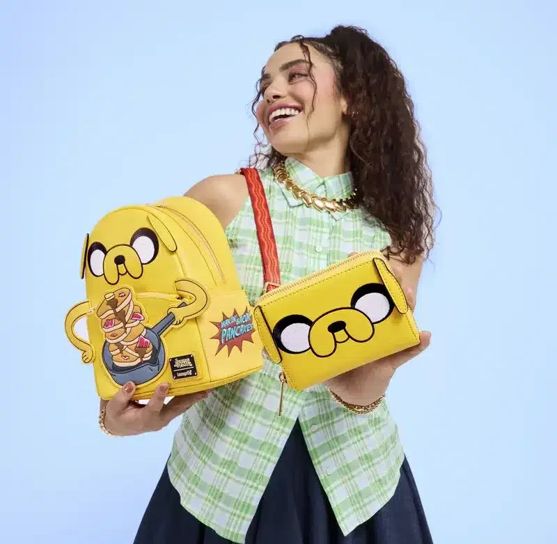 a girl carrying Loungefly Adventure Time Backpacks