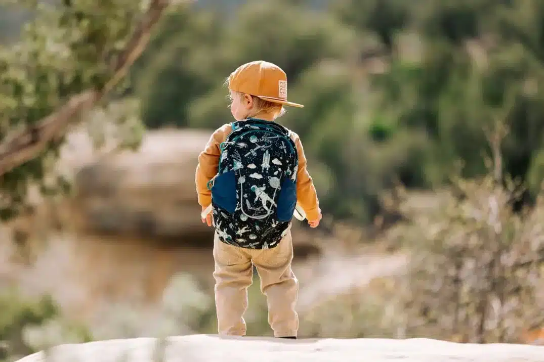 back of a kid wearing Osprey Daylite Kids